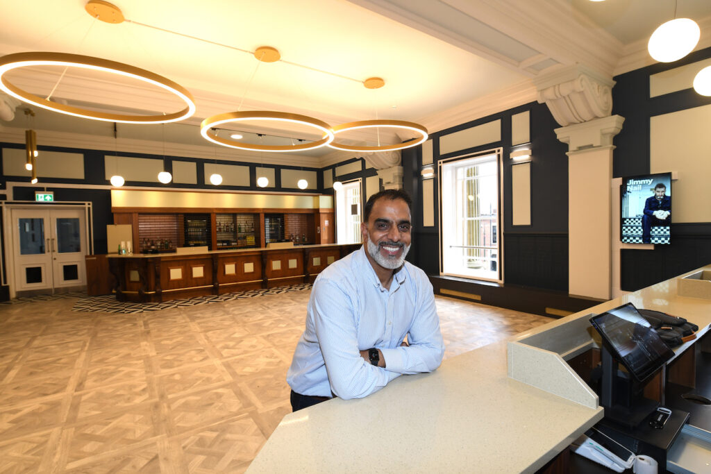 Councillor Quesir Mahmood inside King George’s Hall, Blackburn.